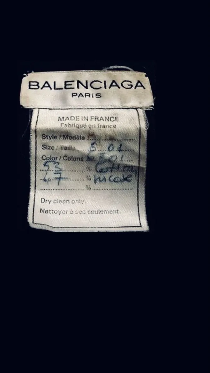 Older Balenciaga Paris wash tag with handwritten style, size and colour fields.