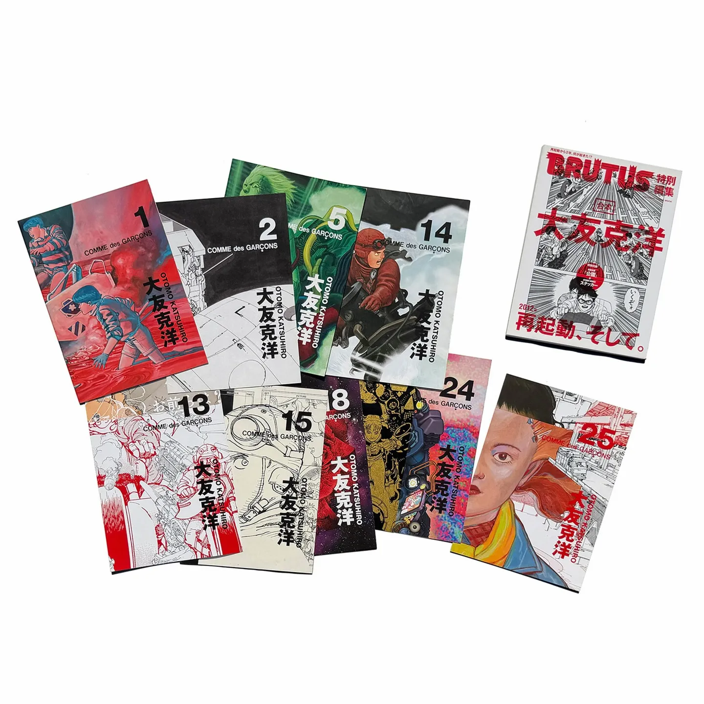 Flatlay of nine Comme des Garcons Otomo direct mail booklets plus the Brutus magazine special issue, numbered 1, 2, 5, 8, 13, 14, 15, 24, and 25.