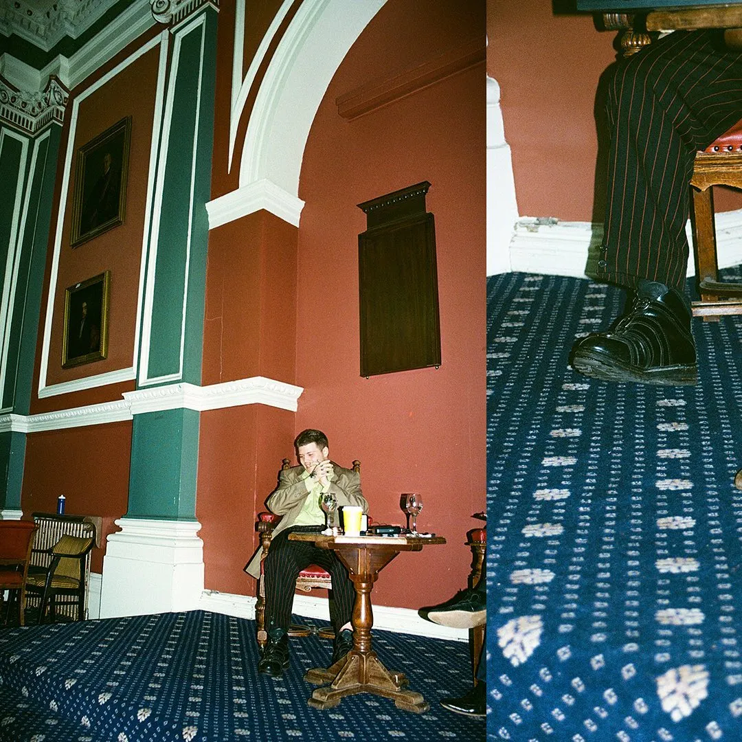 Yung Lean seated in an ornate wood-paneled hall at Trinity College Dublin, and a detail of his boot on a patterned carpet.